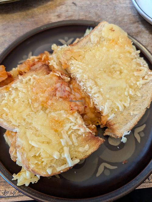 Photo doesn't do it justice - kimchi and vegan cheese toastie!! at The Garden Coffee House in Hexham