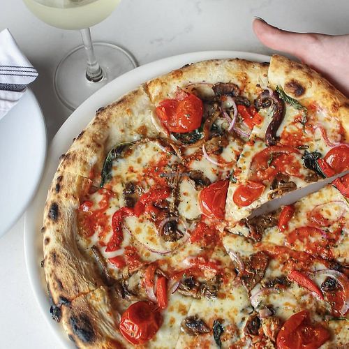 Giardiano pizza (request vegan cheese replacement)  at Rocca Pizzeria in Baton Rouge