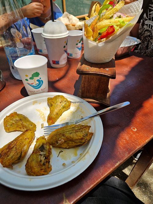 Stuffed zucchini flowers and pita with grilled mushrooms at Chyma Sto Kyma in Crete