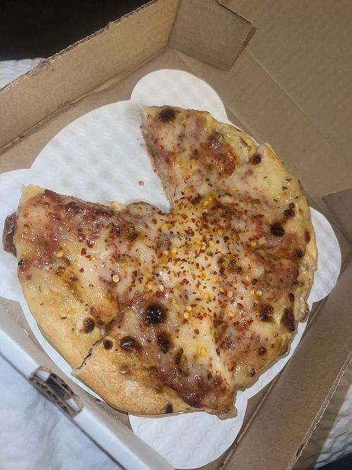 This was quite yummy. Small vegan pizza with vegan tomato sauce that they only recently got in stock.  at North Face Pizza in Jasper