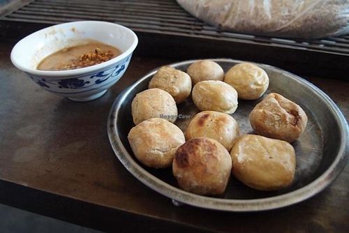 Grilled tofu with peanut and chilli sauce. at Wenjun in Jianshui