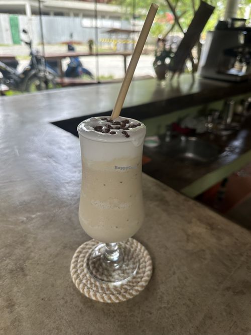 Delicious toffee banana shake on oat milk and dairy free whip  at The Wavy Moon in Siargao
