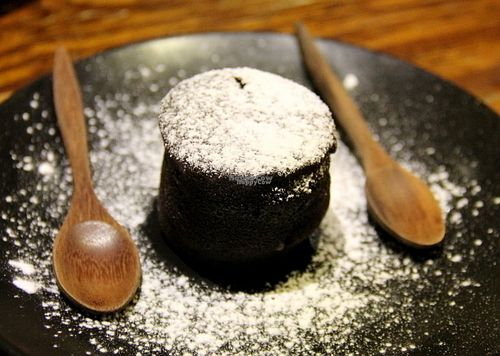Vegan lava cake. Spongy from the outside, chocolate pudding inside.  at Mango in Bangkok