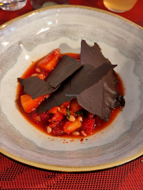 Dessert - pine nuts and strawberries in a syrup with spicy pepper and home-made dark chocolate flakes at So Dream in La Rochelle