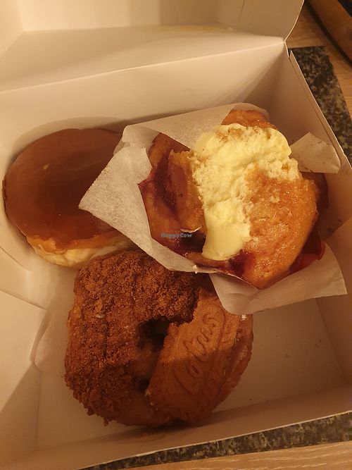 (Top left) Fudge donut. (Top right) Strawberry cheesecake muffin. (Bottom) Biscoff & cinnamon donut. at Coughlans Bakery - Dorking  in Dorking