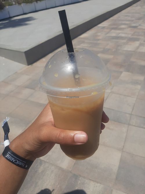 Caramel iced coffee with oat milk at Restaurante Las Arenas in Ibiza