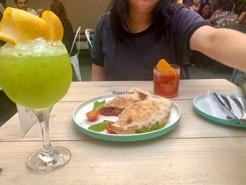 I had the spring special fresh cucumber based cocktail and my friend had another one from the spring special menu. They were both kicking but refreshing!  at Bar Galería Aura in Concepcion