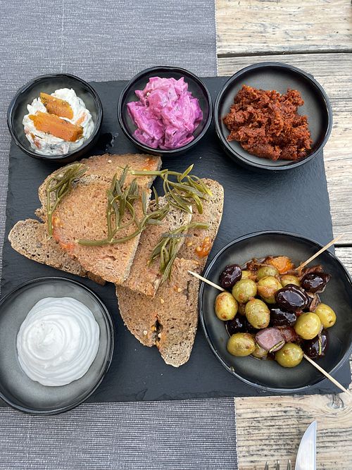 A sampling of Scandinavian night. Pickled eggplant “herring” and carrot “smoked salmon” schmear and a tomato/almond chorizo. This was so creative and outstanding    at Villa Vegana in Mallorca