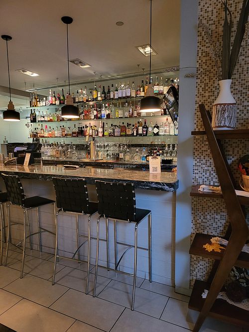 Fully stocked bar at Equinox Restaurant in Washington