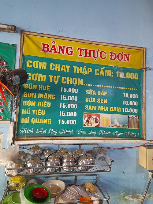 Menu on the wall in Vietnamese only at Com chay Vạn Duyen in Ho Chi Minh City