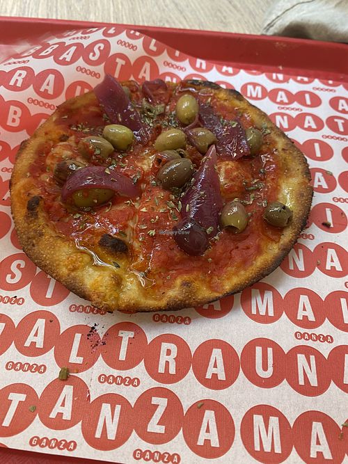 Pizzetta rosa with olives and onions   at Pizzeria al taglio Ganza - Mai Abbastanza in Florence