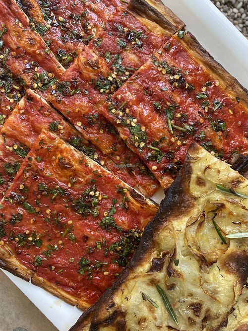 Vegan red pizza and pizza with baked potato  at Antico Forno Roscioli in Rome