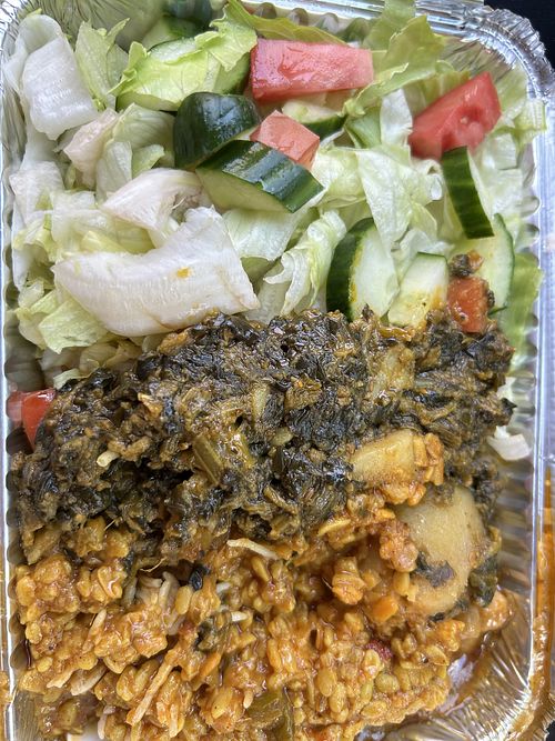 Spinach, lentils, chick peas and salad over rice   at Desi Asian Bazar  in Huntington Station