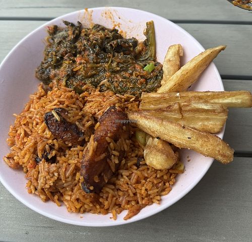 efo riro with jollof, plantain and cassava fries  at The Flygerians - Peckham in South East London