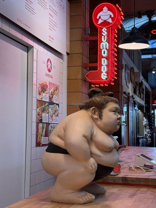 Little guy at cash register   at Sumo Dog - Food Stand in Napa