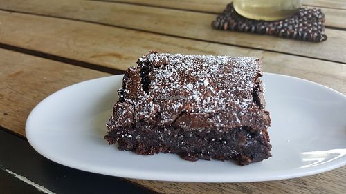 Warm chocolate brownie - gooey inside and crisp top! at Krush Juice Lounge in Apia