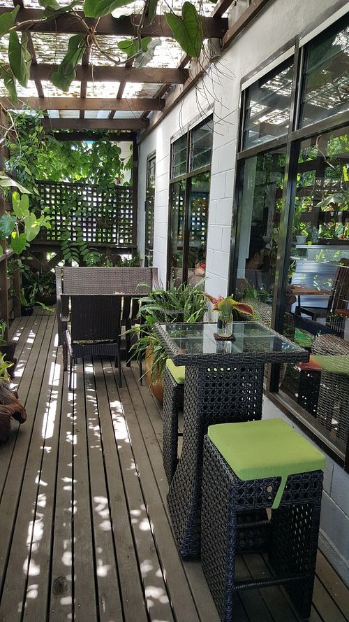 Green outdoor seating! :) at Krush Juice Lounge in Apia