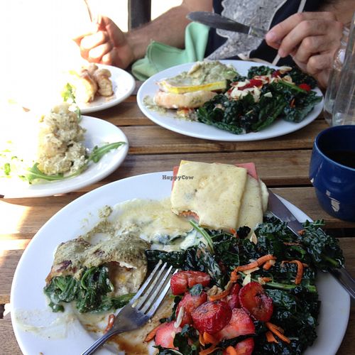 Splitting two brunch entrees: the savory crepe and the tofu benedict with kale side salad (with strawberries, almonds, carrot and a balsamic vinaigrette). Yummy! at Two Mammas Vegan Kitchen in Oakland