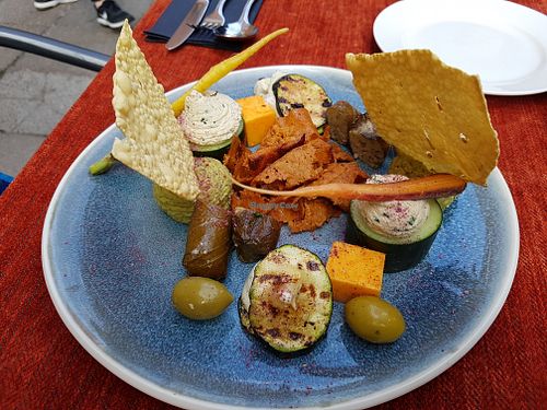 Starter plate for two: hummus, seitan, cheddar, fig leaf, olive at Vegan Restoran V in Tallinn