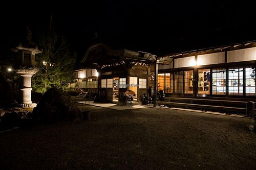 Front door at night at Ekoin in Koya