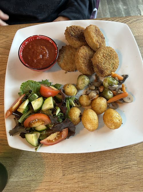 Vegan patties with potatoes and vegetables   at Edinborg Bistro in ísafjarðarbær