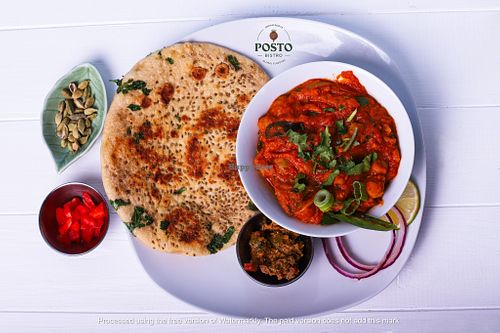 Aloo Paratha and Chole - Flat bread filled with potato and chick peas curry at Posto Bistro in Prague