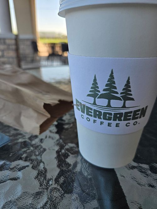 Oatmilk matcha latte and everything bagel at Evergreen Coffee Company - E 86th St N in Owasso