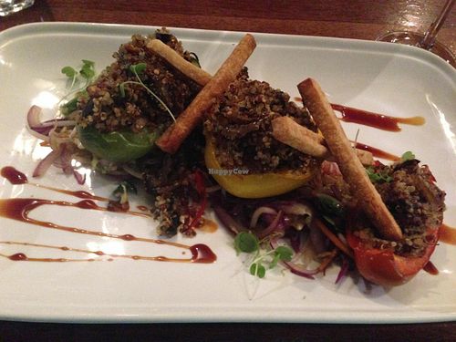 Quinoa/frield mushroom filled peppers with stir-fried wombok/red cabbage/chilli/snow peas and wilted baby spinach and teriyaki glaze. at Vivo Bar and Grill in Palm Cove