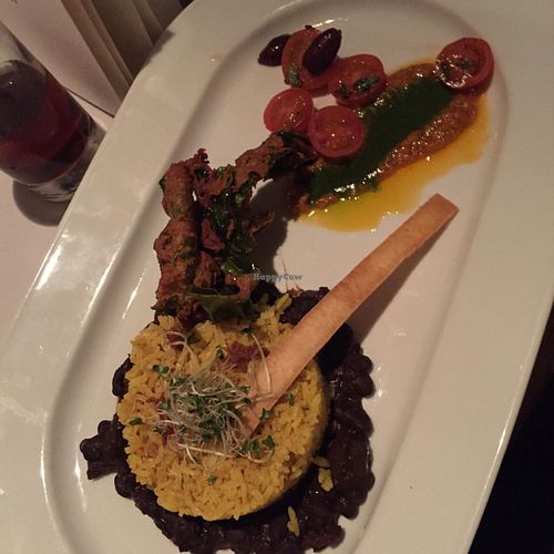 curried rice with beans, spinach beignet and tomato salad at Gare du Nord in Rotterdam