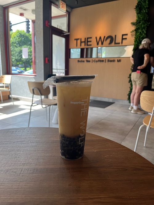 Mango Milk tea with Oat Milkk  at The Wolf in Oak Park
