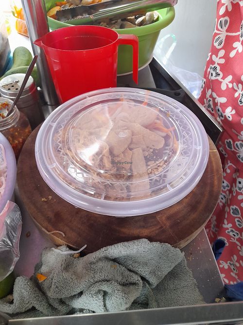 Preparing my take away vegan food at Quán Chay Kinh Moi in Ho Chi Minh City