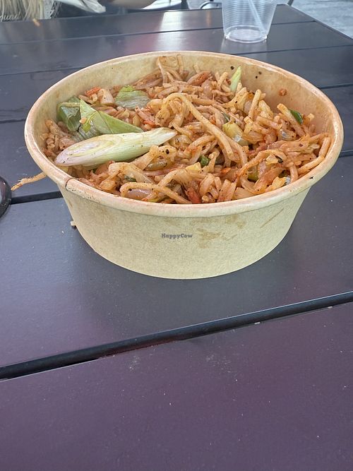 This was the Szechuan noodle dish after we ate a bunch off the top. It was overflowing.  at Sri Annapoorani in South Jordan