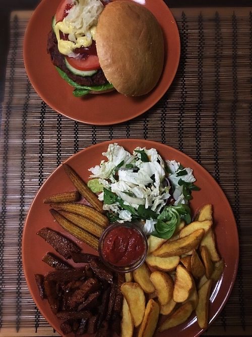 Black bean burger & barbeque seitan at Kozmosz Vegan Etterem in Budapest