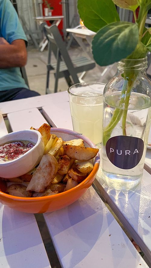 Baked potatoes with fermented cashew cheese  at PURA in San Isidro