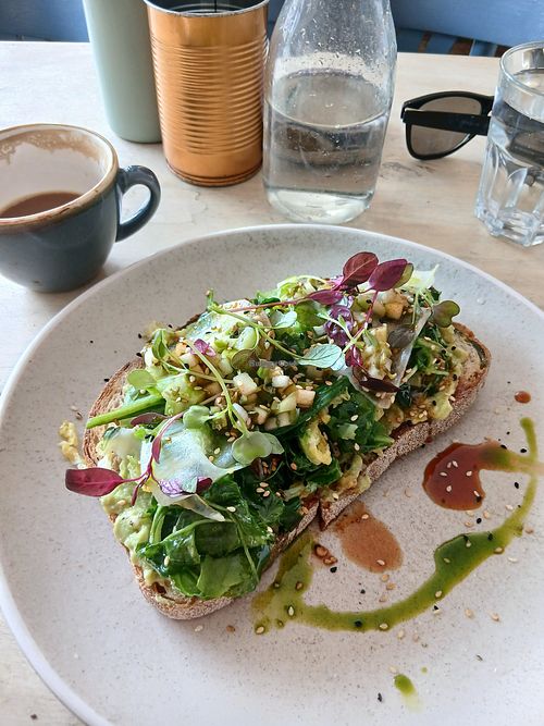 Smashed avo - best I've ever had! Hot maple with chilli, daikon, sesame at Starfish & Coffee - Coffee, Brunch, Pizza in England