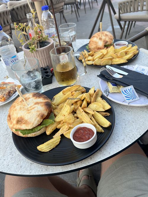 Vegan burger with fries  at Giannou Kentriko cafe in Kos