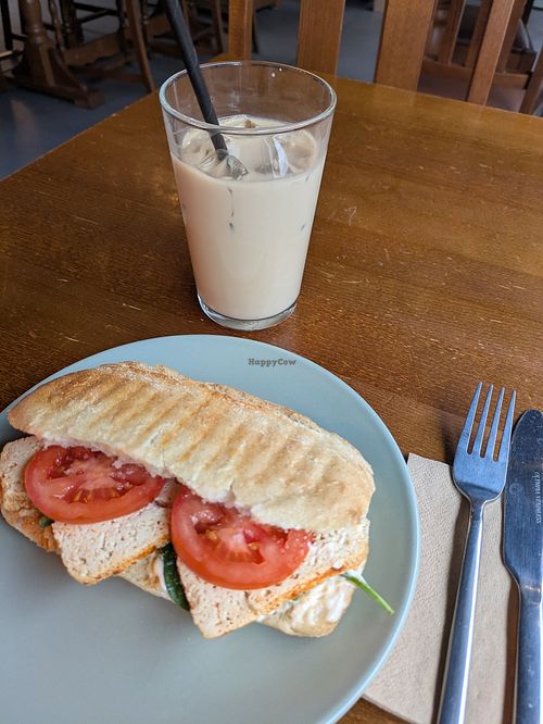 Tofu and tomato sandwich and an iced oat latte at The Sheffield Bolthole in Sheffield