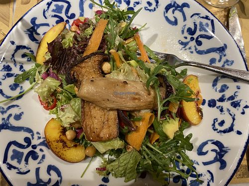 Salad with grilled peaches and king oyster mushrooms  at Trattoria Officina in Wien