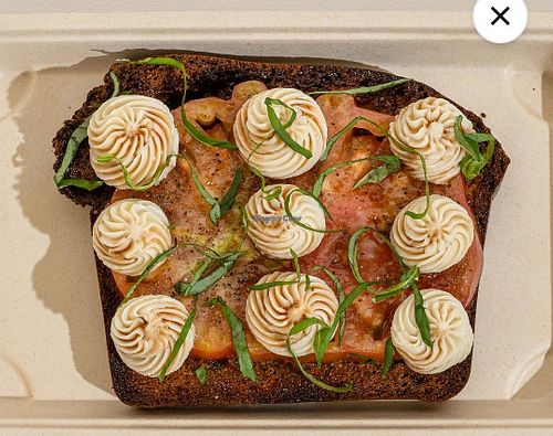 vegan burrata sandwich at Less than usual in العاصمة