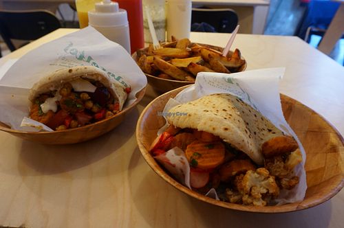 Falafel with marinated cauliflower, radish, tomatoes, fresh herbs, red beet, carrot and some more chickpeas. And of course another squeeze of tahini!
Pick whatever you like or keep it simple, whatever you prefer :)  at Falafel Tof in Antwerpen