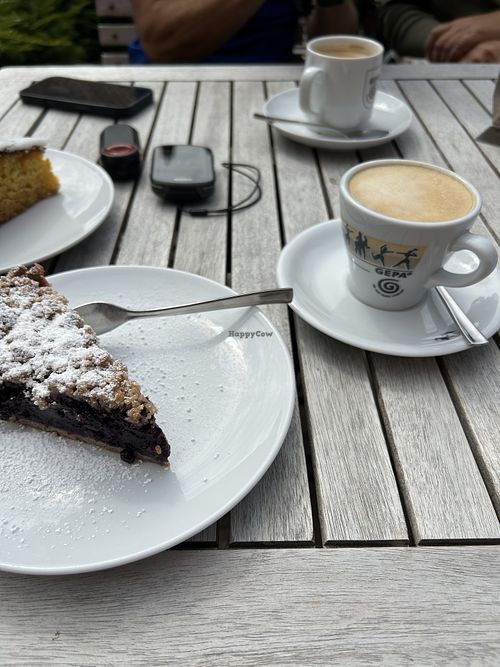 Vegan cakes, cappuccino with oat milk and black coffeee  at Cafe Bischofsherberge in Ratzeburg