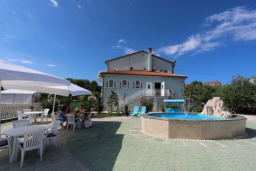 Lunch-Time on the terrace of the pension at Pension Cherry Blossom in Liznjan