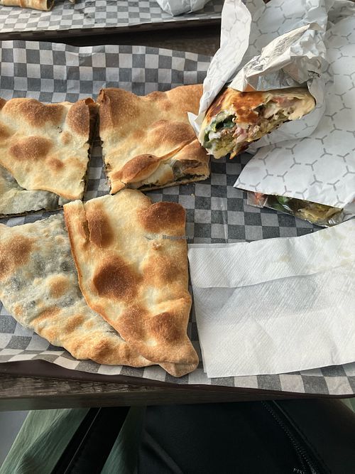 Spinach manakeesh and falafel wrap   at Levande Bakery & BBQ in Toronto