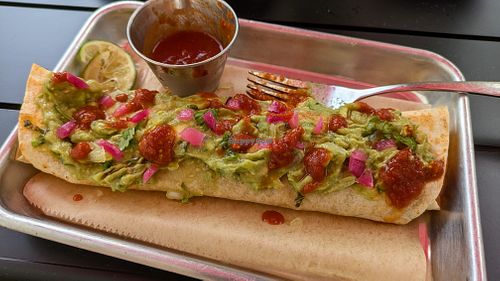 Burrito with cauliflower chorizo and a plethora of toppings(I loaded it up myself). at Fuego Tacos & Mezcal in Winchester