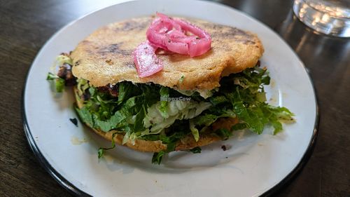 The Gordita is awesome! Ask no cheese or crema, sub cauliflower chorizo, add extra pickled red onions and hot sauce! at Fuego Tacos & Mezcal in Winchester