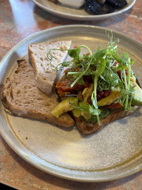 Avo, sundried toms and pomegranate sourdough breaky   at Poppi Red in Hawkshead
