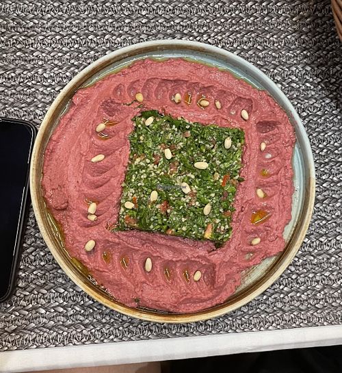 humus with salad and seeds  at BUCATTERIA in Județul Brașov