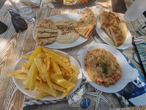  at Monaxia Taverna bar in Rhodes