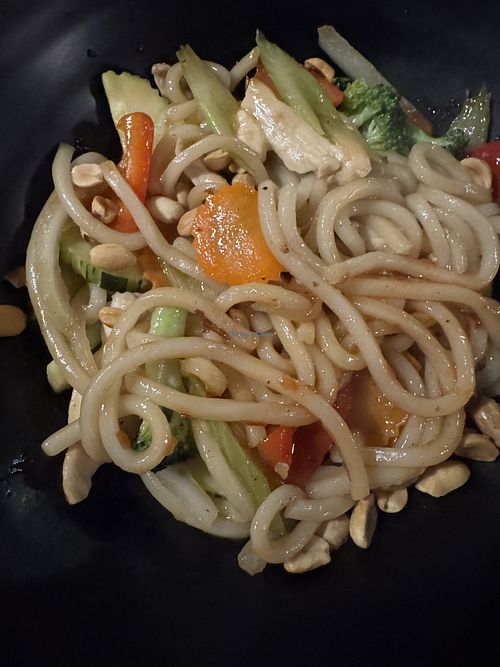 Spicy Udon Noodles (served with accidental chicken)  at Trike Noodles (Three Wheels Noodles) in Chicago