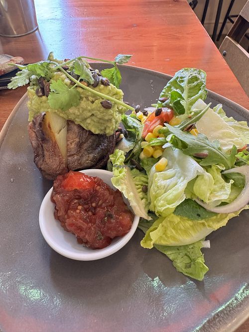 Lovely jacket spud with proper crispy skin!  at JJ’s Cafe in Hollywood